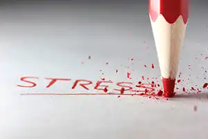 Stress written in red pencil