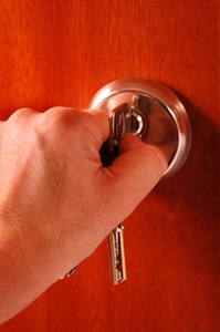 Hand unlocking door