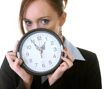 Woman holds clock