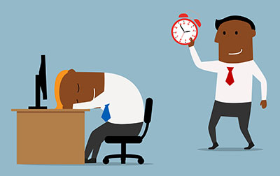 Man holds clock over colleague