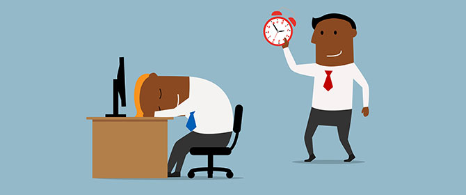 Man holds clock over colleague