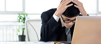 Stressed man at desk